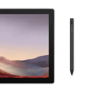Alogic Active Microsoft Surface Eingabestift in Schwarz neben einem Surface-Tablet zum Schreiben und Zeichnen