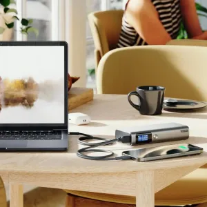 ALOGIC Ruck 20,000mAh power bank in silver, charging a laptop and smartphone via USB-C