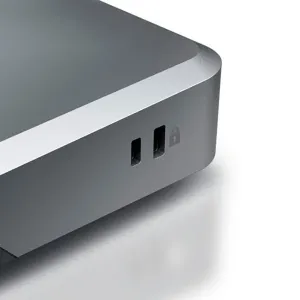 ALOGIC PRIME DX2 Universal Dock i rymdgrått, närbild av öppningarna på framsidan och låsikonen på dockningsstationen.