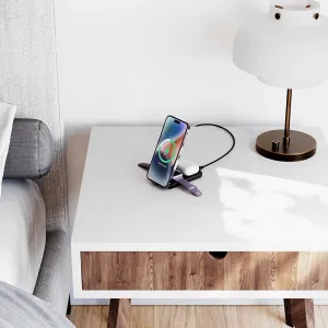 ALOGIC YOGA wireless charging stand with upright phone, AirPods case and cable on a bedside table.