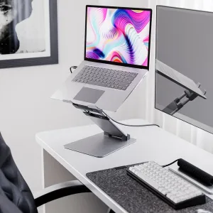 Verstellbarer Alogic Elite Plus Laptop-Ständer mit einem Laptop auf einer stabilen Basis in einem aufgeräumten Arbeitsbereich