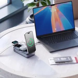 Tragbare ALOGIC Roam-Powerbank lädt ein Smartphone, eine Smartwatch, Ohrhörer und einen Laptop auf einer Tischplatte