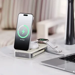 ALOGIC Roam Powerbank lädt ein Smartphone und eine Smartwatch auf einem Schreibtisch, daneben ein Laptop