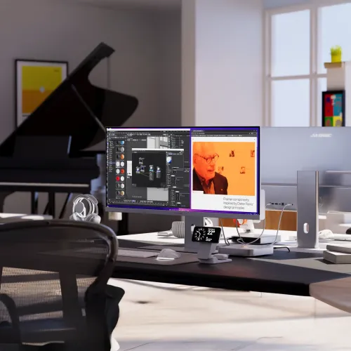 Erittäin leveä 40 tuuman hopeanvärinen näyttö, jossa on ohuet kehykset pöytäjalustalla, liitetty kaapelilla ja näytetään jaetussa näkymässä työpöydällä.