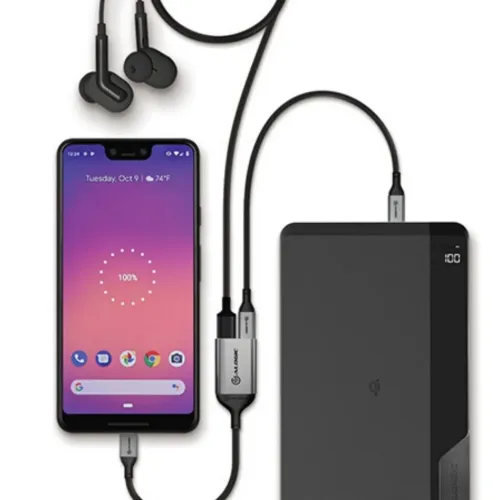 ALOGIC Ultra USB-C to USB-C adapter in space gray with two USB-C ports, connected between mobile, USB-C headphones and power bank.