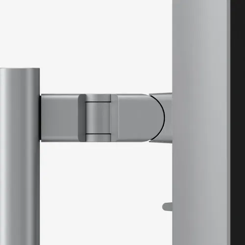 ALOGIC Clarity 27" ekrāns sānskatā, piestiprināts pie metāla statīva ar šarnīrveida roku un cilindrisku balstu pie ekrāna aizmugurējās malas.