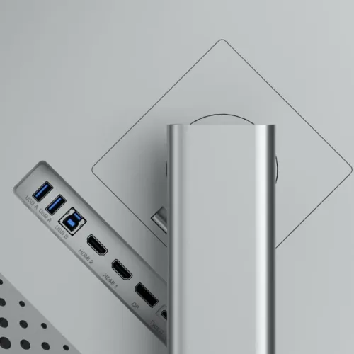 ALOGIC displejs no aizmugures ar sudraba statīvu un sānos vērstu portu joslu: 2x USB-A, USB-B, divi HDMI, DisplayPort un USB-C ports.