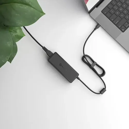 ALOGIC USB-C GaN desktop charger, rectangular black adapter with two cables; one connected to laptop, other coiled.