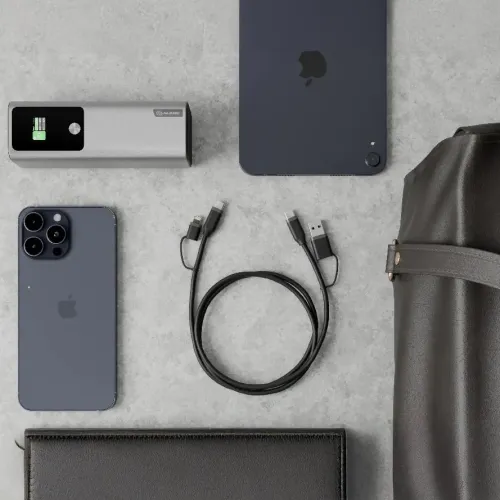 ALOGIC Elements silikon 4‑i‑1 USB 2.0‑kabel, svart, rullad på ytan, med kontakter: USB‑A, USB‑C och Lightning i ändarna.