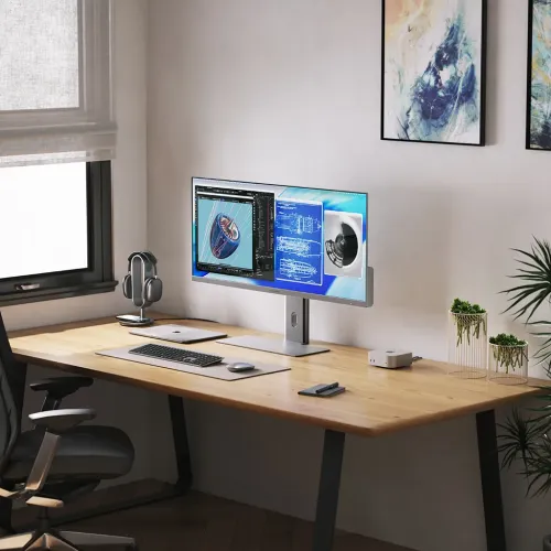 ALOGIC Edge 5K 40-inch ultrawide monitor on a silver stand in a modern home office workspace